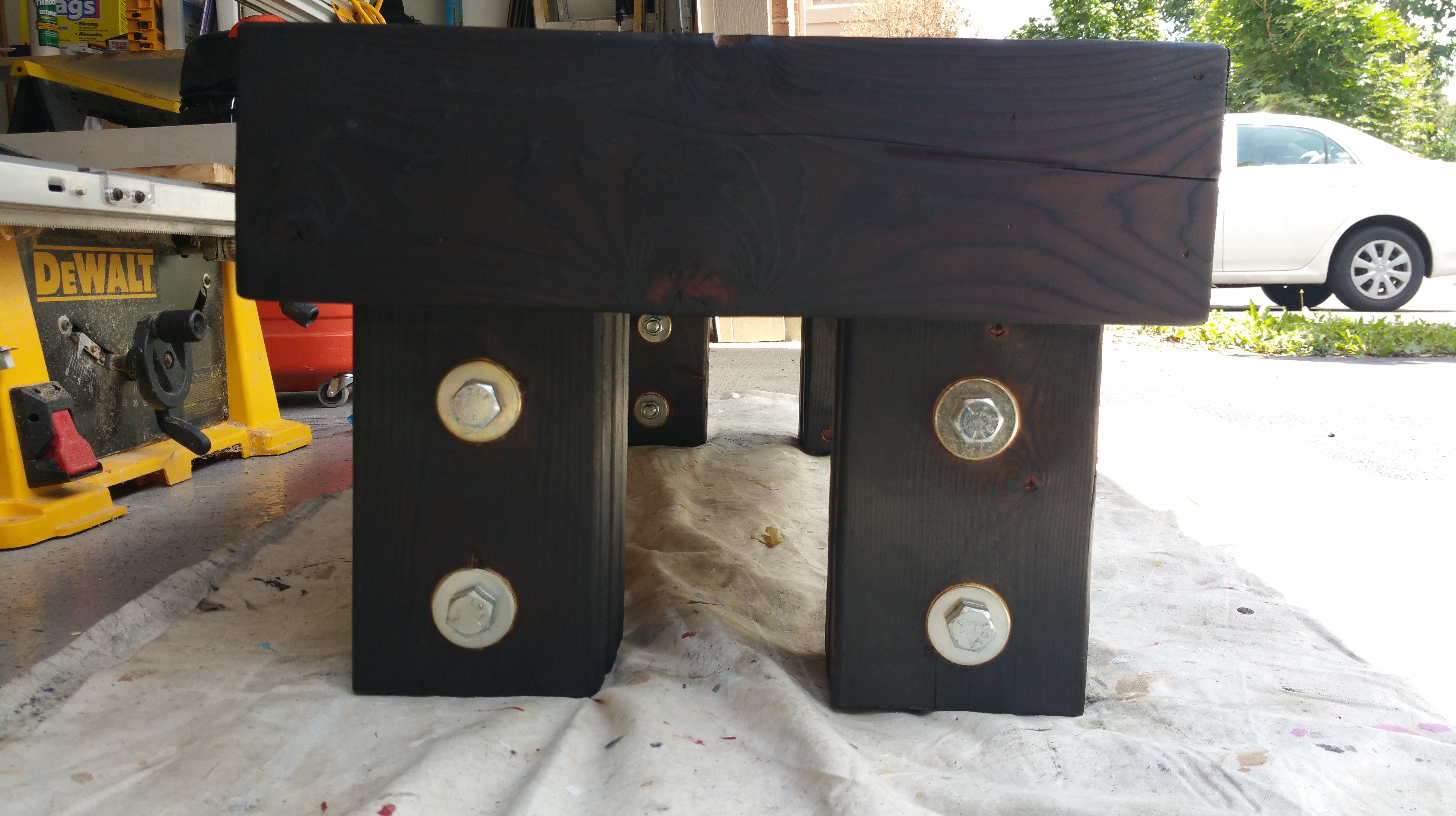 charred bench side view of legs