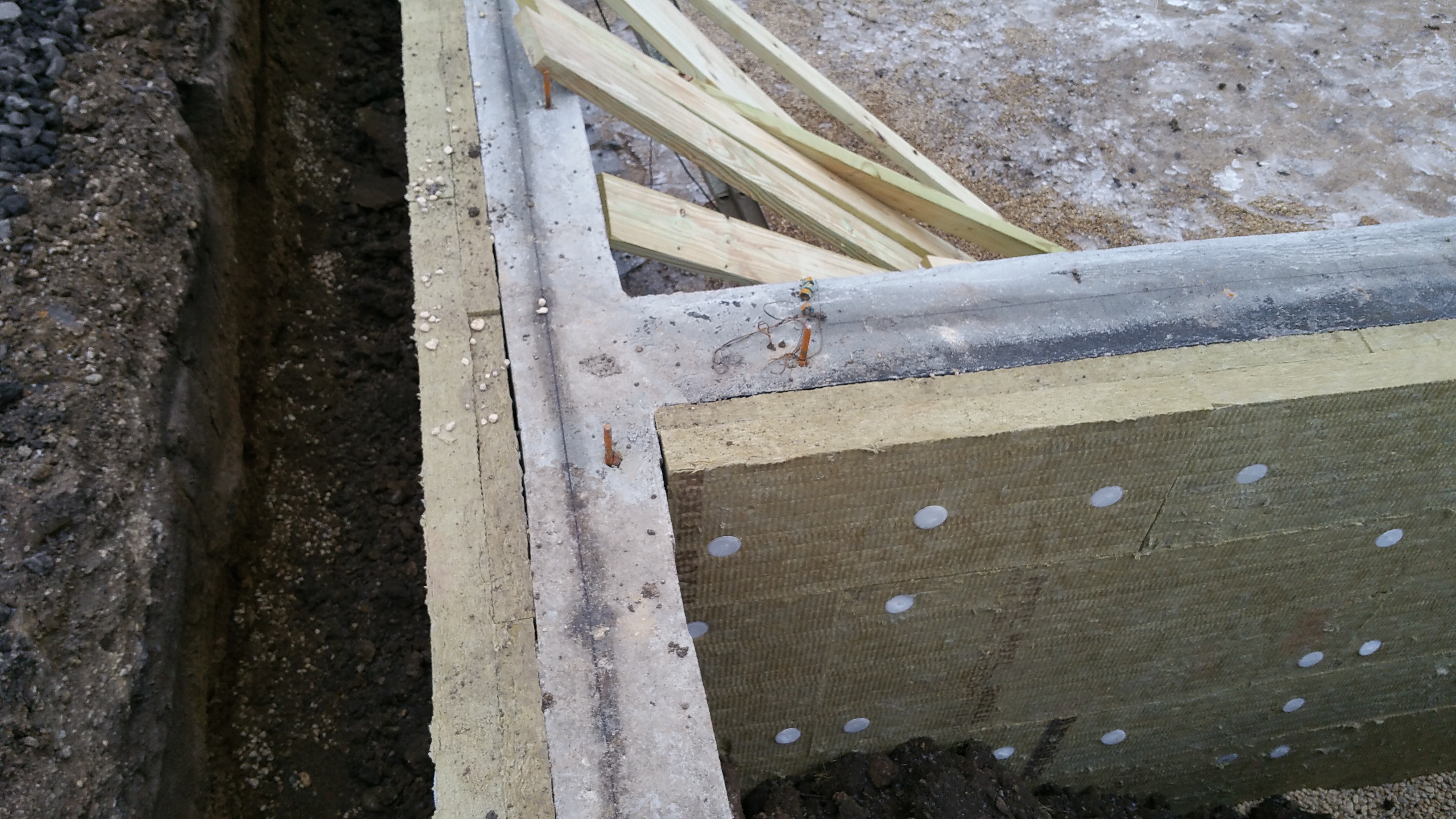 south-view-of-garage-house-foundation-connection-w-roxul