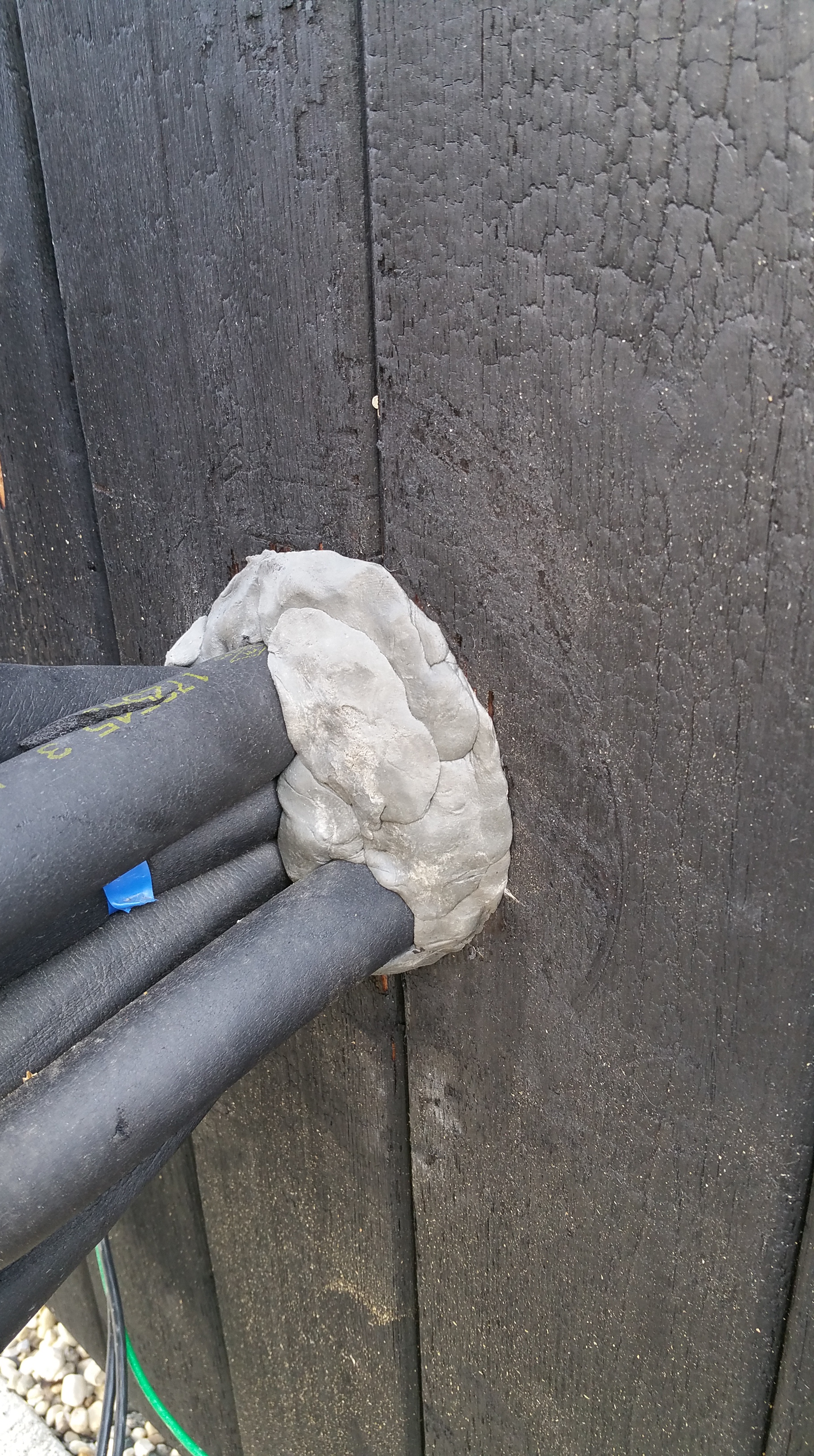 Heat pump lines w: duct seal and siding