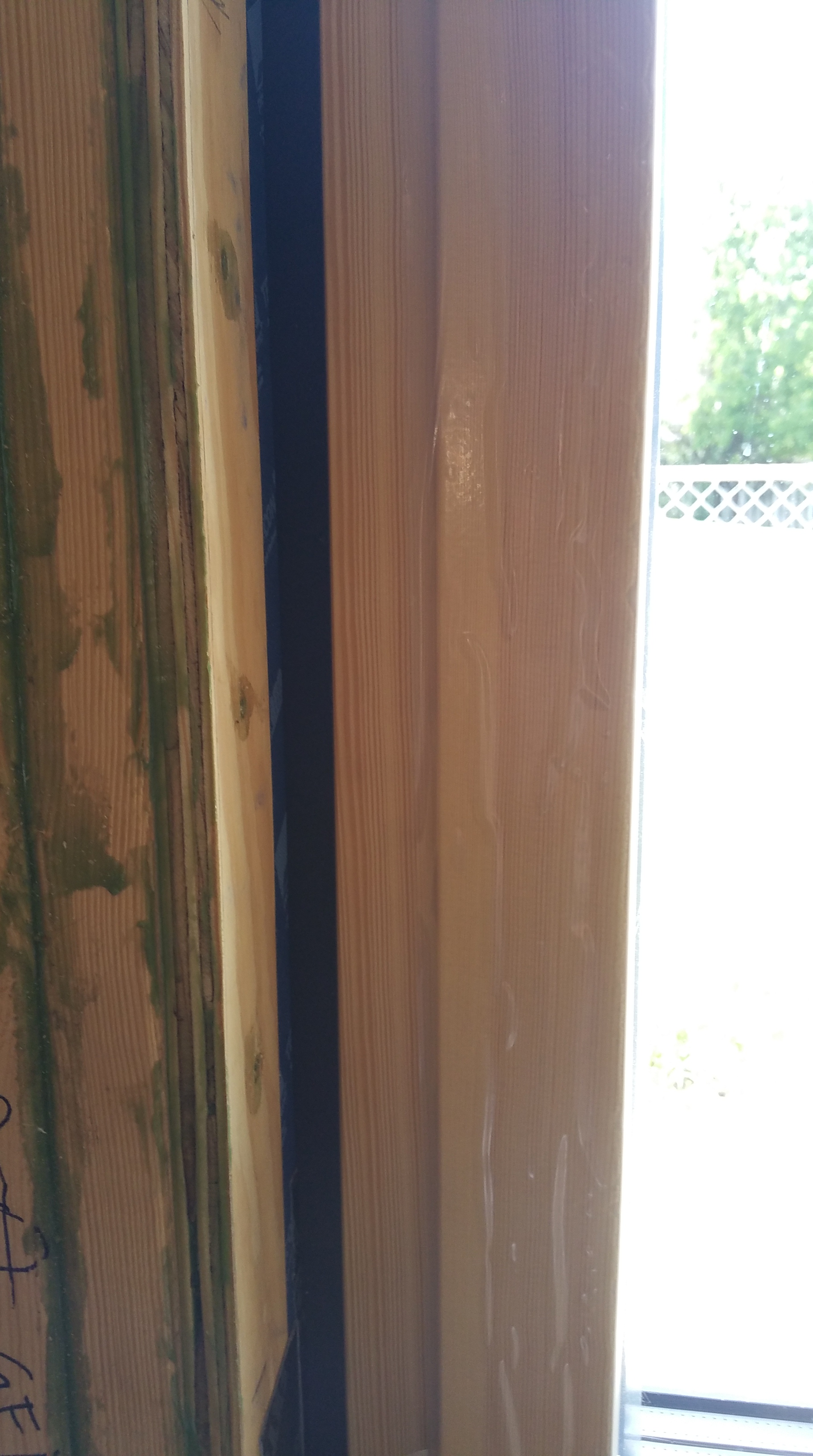 lft side wdw frame gap filled w: blk foam