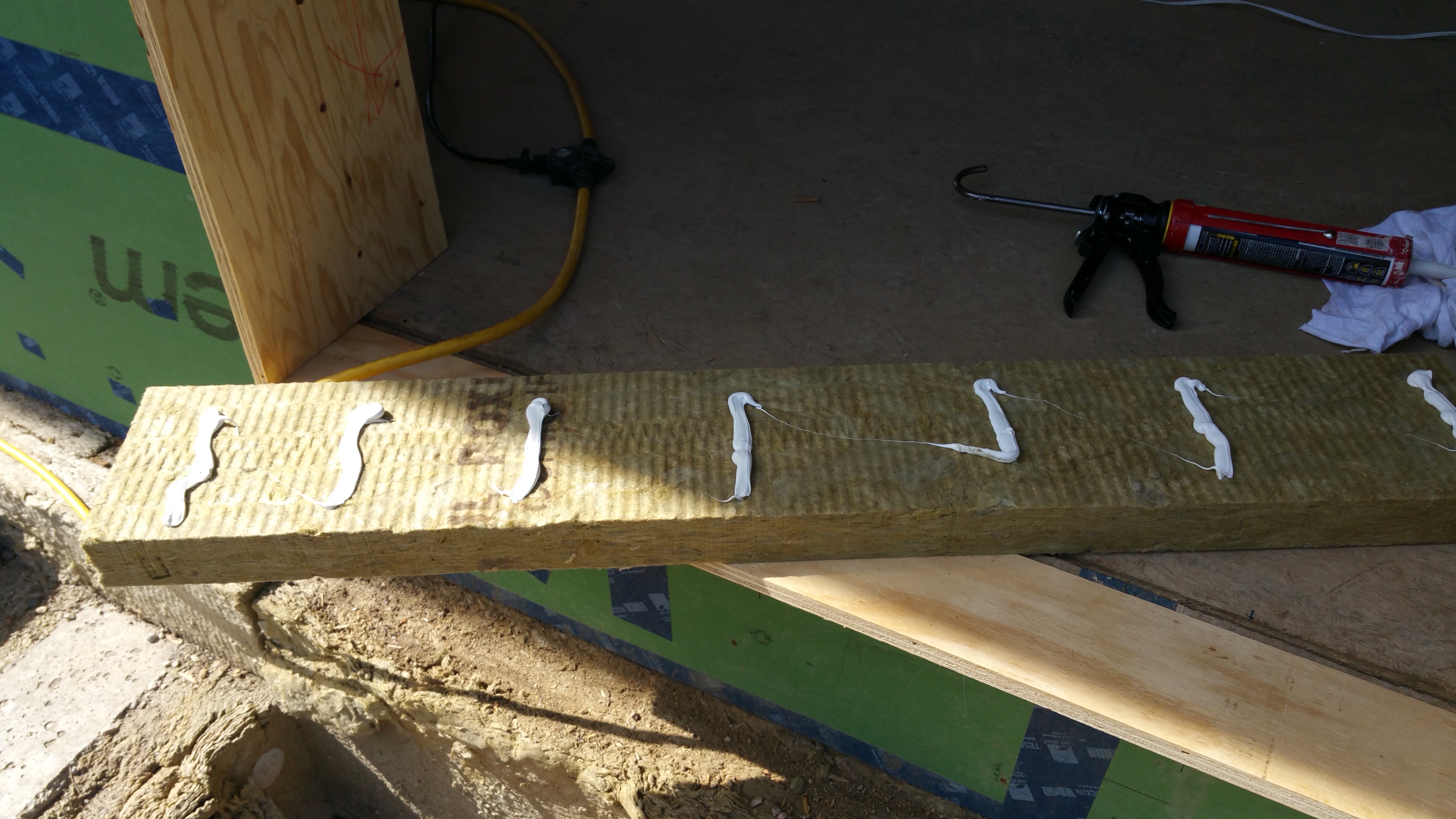 rockwool for under door buck