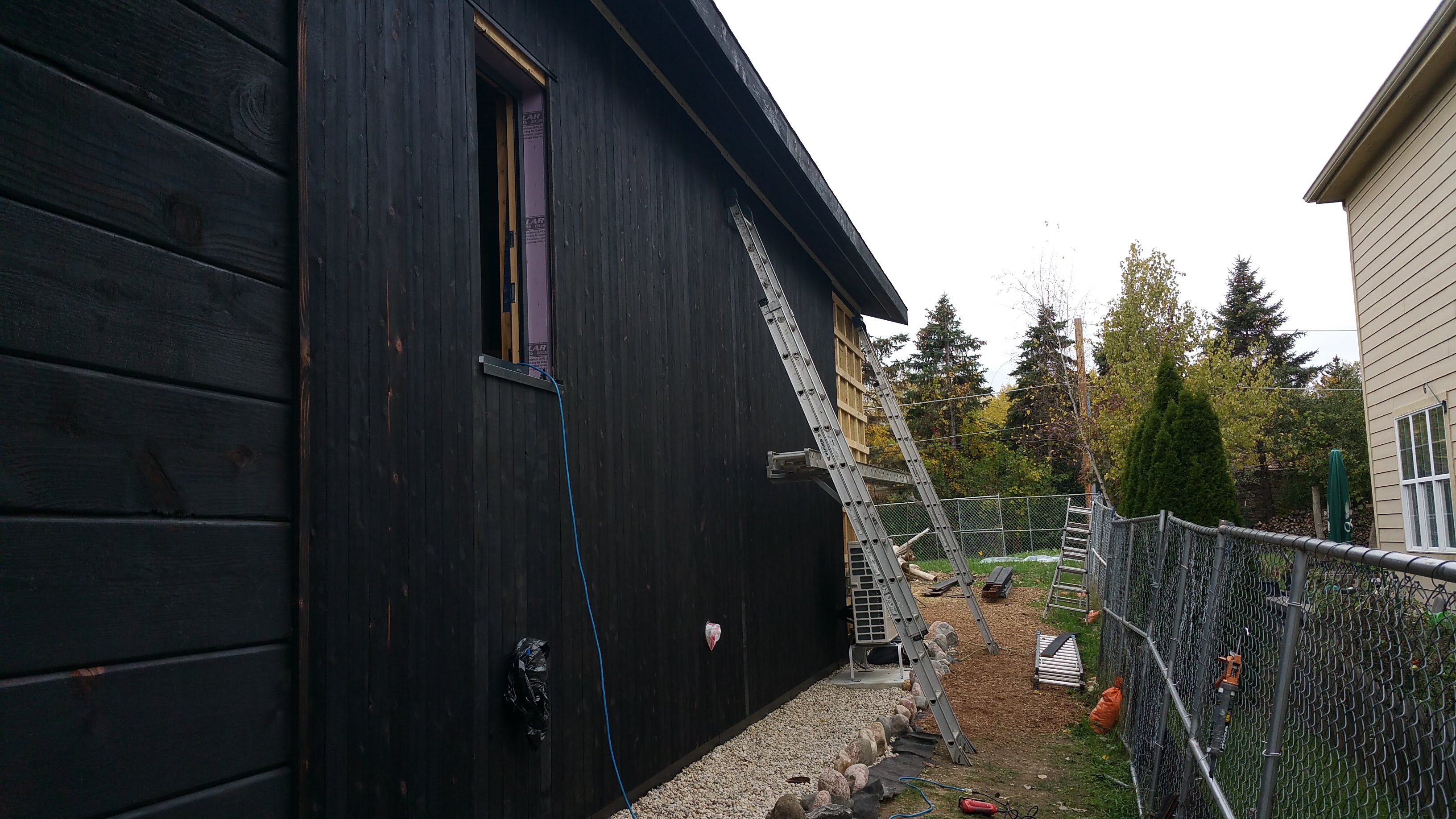 black overhangs and siding