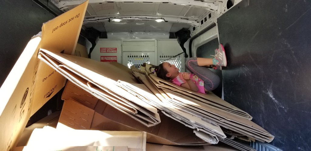 cardboard appliance boxes in van