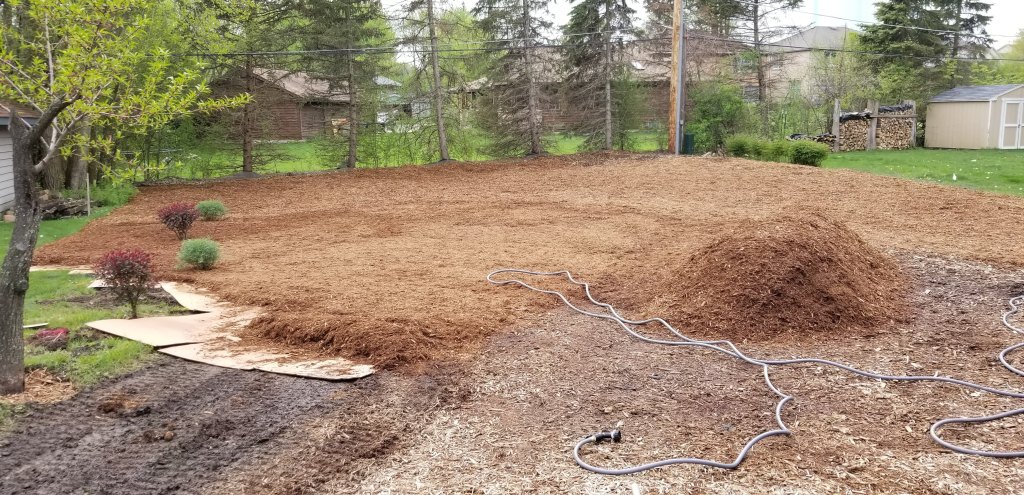 sheet mulching and hügelkultur raised bed